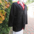 Stunning black boutique made brocade fully lined long sleeve collar less jacket. Size 42/18.New cond