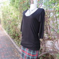 Casual long black viscose stretch top with gathered bottom sides.Elbow sleeves.By WOOLWORTHS size 36