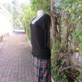 Casual long black viscose stretch top with gathered bottom sides.Elbow sleeves.By WOOLWORTHS size 36