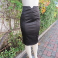 Luxury black satin look stretch polycotton bodycon high waisted skirt. Wide yoked waistband.Size 32.