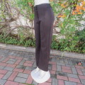 Straight legged black/white pinstripe 100% wash & wear stretch pants size 32 by KELLY ANN