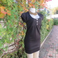 Little black poly/viscose stretch mini dress size 32/8 by RT. Capped sleeves. Empire style.As new.