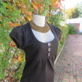 Little black poly/viscose stretch mini dress size 32/8 by RT. Capped sleeves. Empire style.As new.