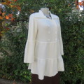Fabulous soft cream knitted cardigan uniquely styled. Double breast look.By PIPER & BLUE 36/12
