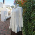 Fabulous soft cream knitted cardigan uniquely styled. Double breast look.By PIPER & BLUE 36/12