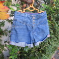 Cute denim shorts by PINK ANGEL for 8 to 9 yr old girl. Unique wide yoked waist. As new.