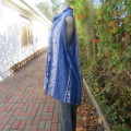 Oversized sleeveless 100% viscose long button down top in royal blue/white patterns.Size 42/18