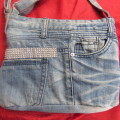 Fashion light blue denim shoulder bag size 28cm x 23cm. Lined with zip-up pocket. Never used.
