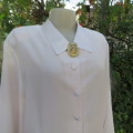 Smart long sleeve off-white top. Button down with satin covered buttons/shirt collar.Size 40. M.H.