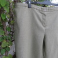 Smart dress pants in asparagus/cream vertical stripe design. Polyester blend.Size 46/22.JUDY`S PRIDE