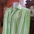 As new striking long cuffed sleeve green/white patterned vertical striped top size 42/18.Open collar