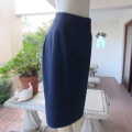 Vintage navy polycotton pencil skirt size 38/14. Perfect fit! Zip and slit at back. 2 button closure