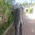 Beautiful silvergrey with black capped sleeve cardi. Wide fold over collar. By OASIS. Size 38.As new