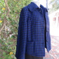 Warm royal blue/black houndstooth textured polyester fully lined jacket. Large size 32/8. New cond.