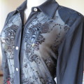 Richly embellished black button down top size 36/12 By TUNG TAI. Back stretch polyester.Front sheer.