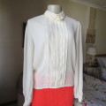 Romantic long sleeve cream polyester blouse from 80`s. Tucked seams front.Size 38/14. Very good cond