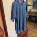 Peacock blue golf shirt in size XXL by OAKRIDGE. Three button front opening. Knitted collar.As new.