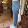 Straight legged blue ankle length jeans by WWW size 34/10. Very little stretch. Pockets back/front..