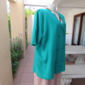 Smart double breast jade colour short sleeve boutique made V front jacket. Size 42/18. New cond.