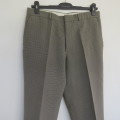 Handsome men`s fine greens and black check polyester pants by MARKS & SPENCER size 34. 74c inner leg