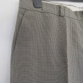 Handsome men`s fine greens and black check polyester pants by MARKS & SPENCER size 34. 74c inner leg
