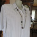 Smart white 100% poly button down/V open collar/short sleeve top.Thin black stripes.WOOLWORTHS 42.
