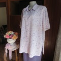 Summer lilac short sleeve button down top with tiny purple flowers. Shirt collar.Size 44/20.New cond