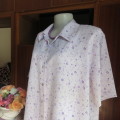 Summer lilac short sleeve button down top with tiny purple flowers. Shirt collar.Size 44/20.New cond