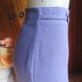 Elegant eggplant colour pencil bandless skirt with thin buckled belt on front. Size 37/13 by DESIGN.