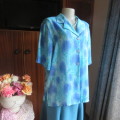 Stunning soft silky button down short sleeve top in medley of blue colours. Size 42/18. By TUNG TAI.