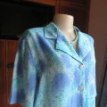 Stunning soft silky button down short sleeve top in medley of blue colours. Size 42/18. By TUNG TAI.