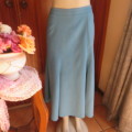 Beautiful kick-out paneled teal colour ankle length skirt. Boutique made size 40/16. As new.