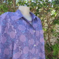 Soft lilac/turquoise polycotton graphic print short sleeve top. Pleat at back. Rounded hems.Size 46