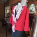 Make a statement in this cherry red polyester jacket with attached floral scarf. Size 46/22. New con