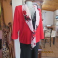Make a statement in this cherry red polyester jacket with attached floral scarf. Size 46/22. New con
