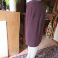Smart suede look pencil skirt just under knee length. Size 38/14. Zip at back. Satin inner. New cond