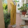 Fashion jumpsuit by PULL & BEAR UK. Size 34 or 36 body hugging. Yellow with white/black stripes.