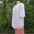 White polynylon, light as a feather short sleeve top with tiny pink flowers. Size 44.V neck.New cond