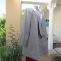 Amazing boutique made long grey/white stripe unlined jacket size 42 to 44. Low lapel collar.As new
