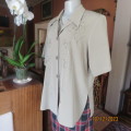 Stunning avo green richly embroidered silky polyester short sleeve top.By TUNG TAI size 40.As new.