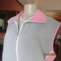 Sporty silky polyester zip-up sleeveless top in smoke grey/pink.Kangaroo pocket.Size 46 to 48.As new