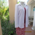 Smart white long sleeve polyester stretch top. Button down /open collar. Embossed stripes. Size 36.