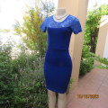 Pretty royal blue knee length bodycon dress in textured stretch polyester.Size 32/8. Doll 34. As new
