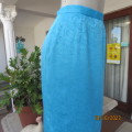 Amazing azure blue lined pencil skirt . With embossed floral pattern. Unique back pleat. Size 35/11