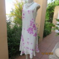 A DESIGNERS Original lined shift dress in sheer polyester.Mint green with lilac posies. Size 36.