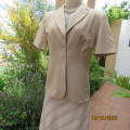 Smart tailored short sleeve wheat colour jacket. Two button closure. By FINNEGANS size 36/12. As new