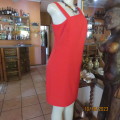 Scarlet red lined polyester smart dress with sleeveless/and shoulder strap. Size 37/13. By LYNETTE.