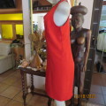 Scarlet red lined polyester smart dress with sleeveless/and shoulder strap. Size 37/13. By LYNETTE.