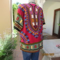 Ethnic slip over short cut-on sleeve top in maroon/stunning designs. Polycotton.Size 40 to 42.As new