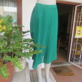 Irresistible emerald green knife pleated calf length skirt size 36/12. Label cut. Sheer poly. As new